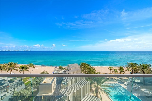 view of water feature with a beach view