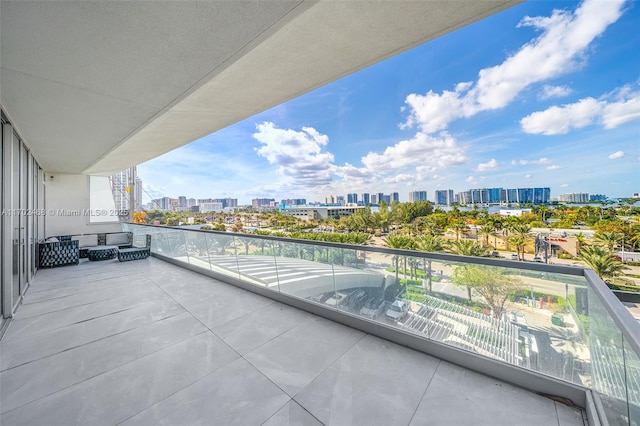 balcony featuring a city view