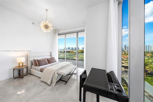 bedroom with a view of city, access to outside, floor to ceiling windows, and a notable chandelier