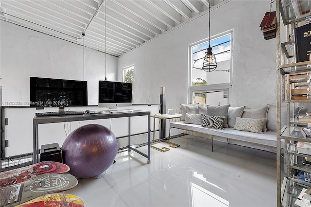 office area with concrete floors