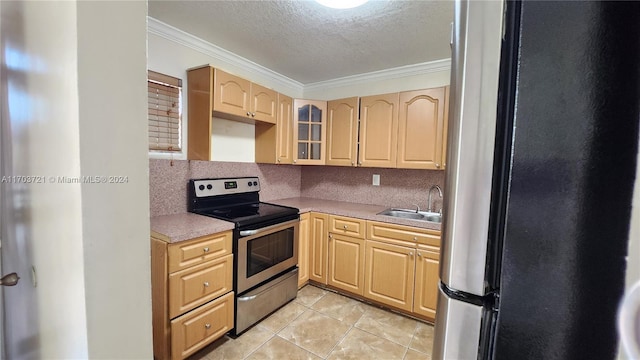 kitchen featuring light brown cabinetry, ornamental molding, a textured ceiling, stainless steel appliances, and sink