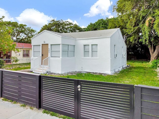 view of front of home with a front yard