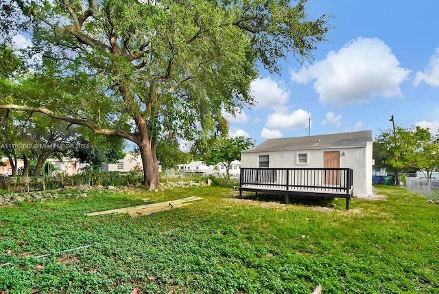 view of yard featuring a wooden deck