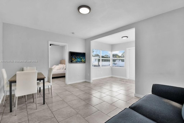 dining area featuring light tile patterned floors