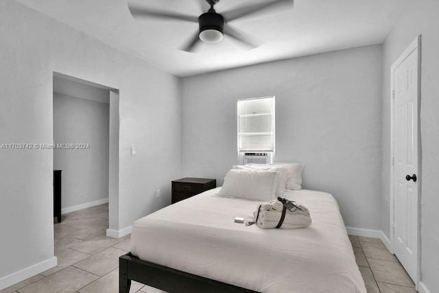 bedroom featuring ceiling fan and light tile patterned floors