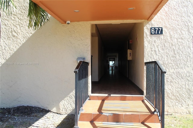 677 SW 9th Ave Unit 103, Miami, FL 33130 - entrance to property with stucco siding and a surveillance system