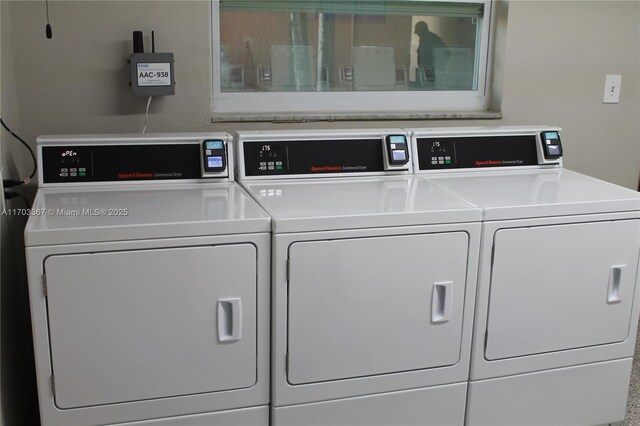 677 SW 9th Ave Unit 103, Miami, FL 33130 - shared laundry featuring separate washer and dryer