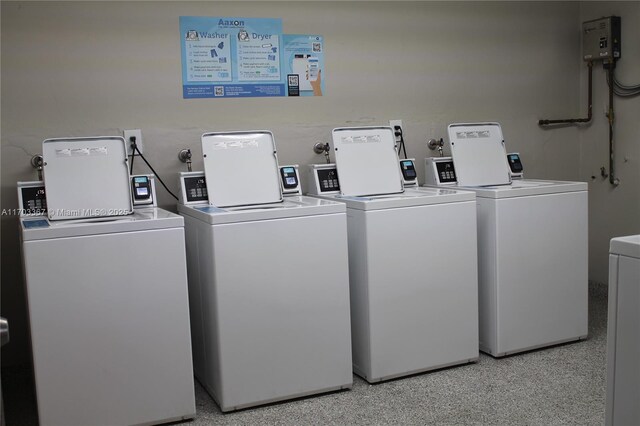 677 SW 9th Ave Unit 103, Miami, FL 33130 - shared laundry room with washing machine and clothes dryer