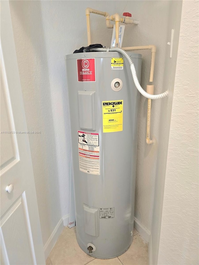 utility room with electric water heater