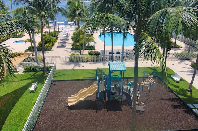 view of play area featuring a lawn