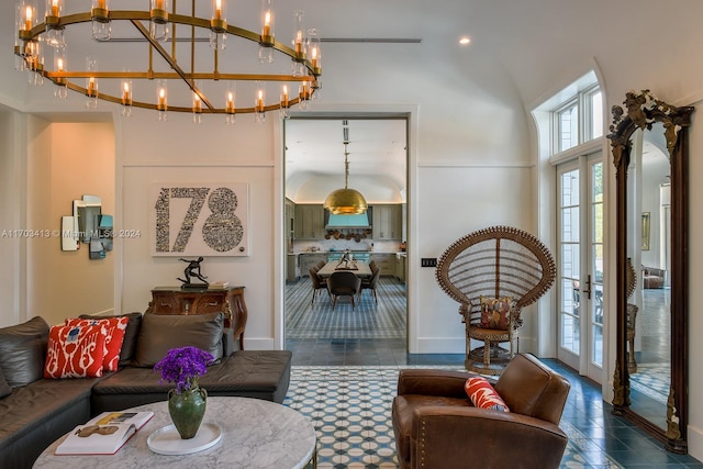 interior space with french doors and an inviting chandelier