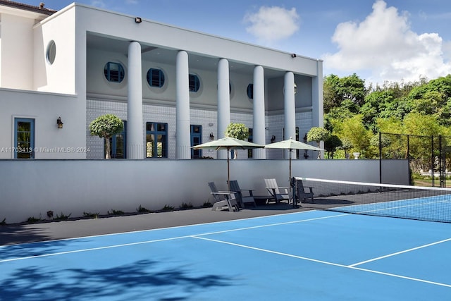 view of tennis court with basketball court