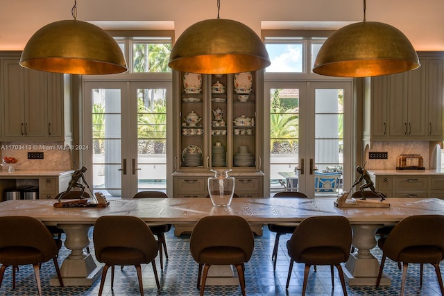 dining space featuring french doors and a wealth of natural light