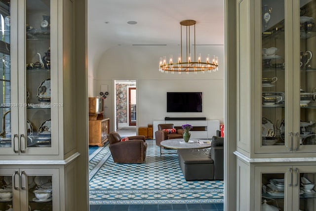 living room with a chandelier