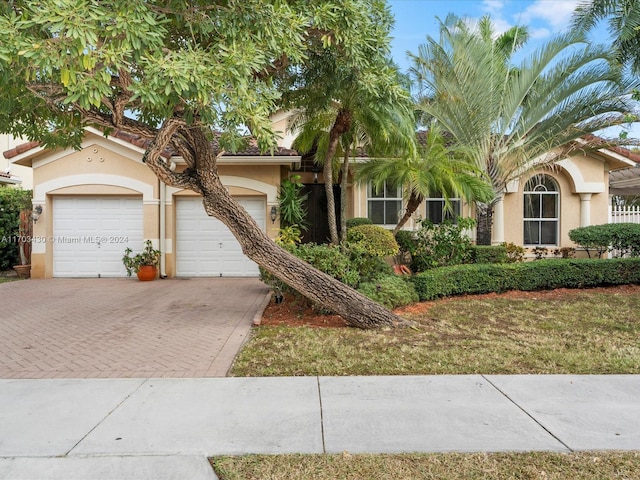 view of front of home featuring a garage