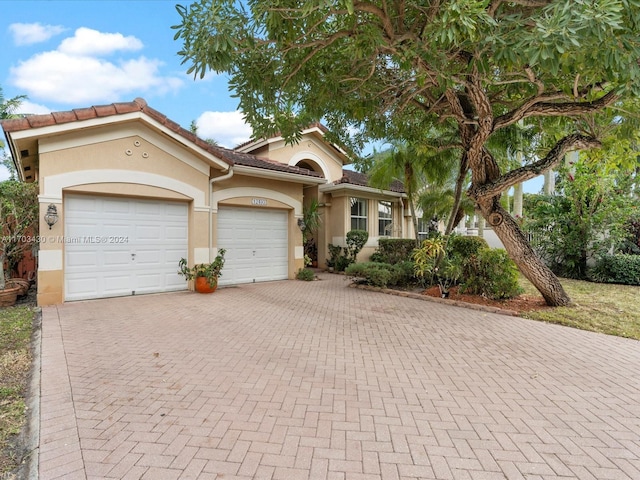 view of front of home with a garage