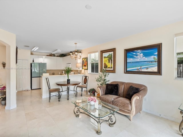 living room with a chandelier