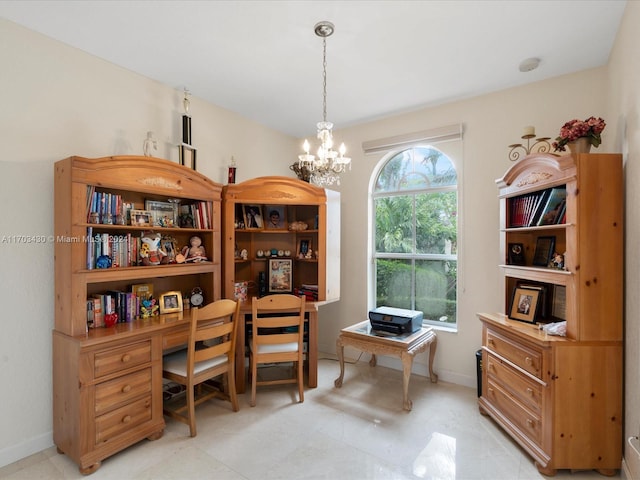 office area with an inviting chandelier