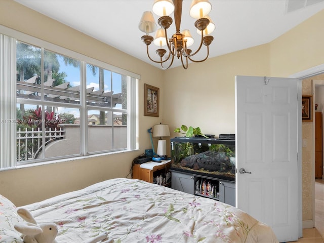 bedroom featuring a chandelier