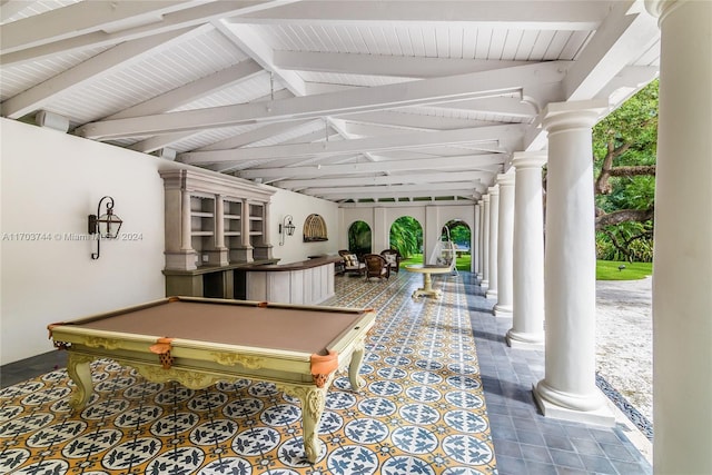 rec room featuring french doors, lofted ceiling with beams, and billiards