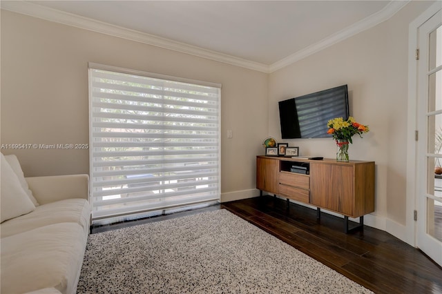 living room featuring baseboards, dark wood-type flooring, and crown molding