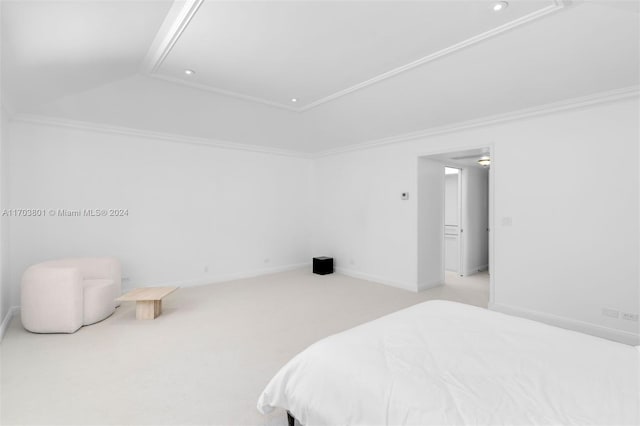 bedroom featuring crown molding and light carpet