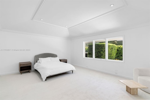 carpeted bedroom with lofted ceiling and ornamental molding