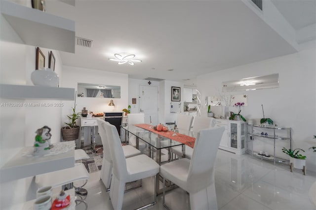 view of tiled dining area