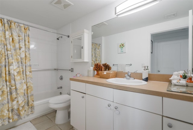 full bathroom featuring tile patterned flooring, vanity, toilet, and shower / bath combo with shower curtain