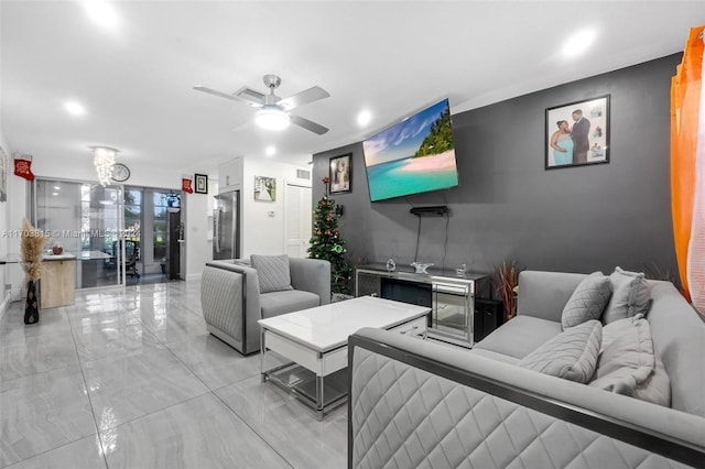 living room featuring ceiling fan