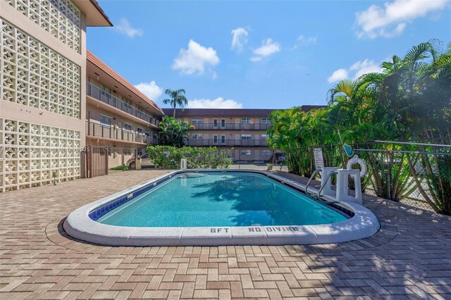 community pool with fence