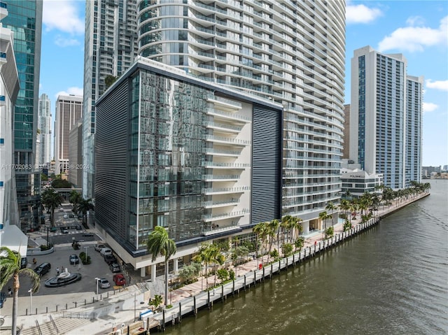 view of building exterior with a water view