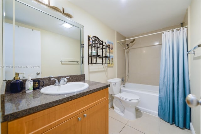 full bathroom with toilet, vanity, tile patterned floors, and shower / bath combo with shower curtain