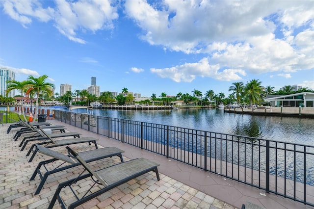 view of patio with a water view