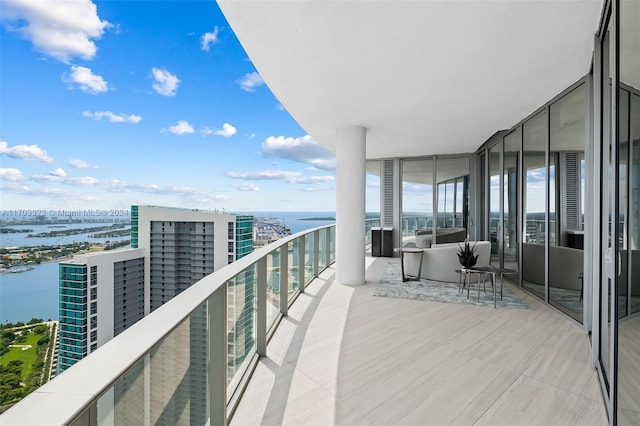 balcony featuring a water view