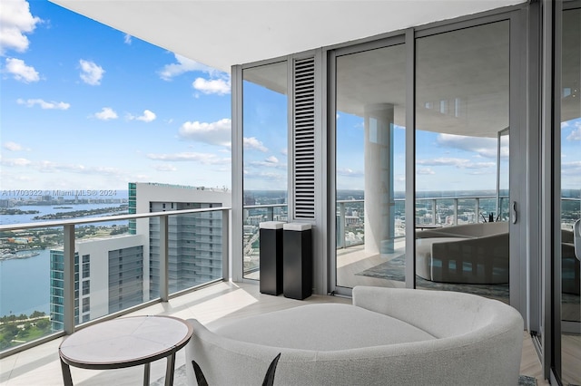 balcony featuring a water view