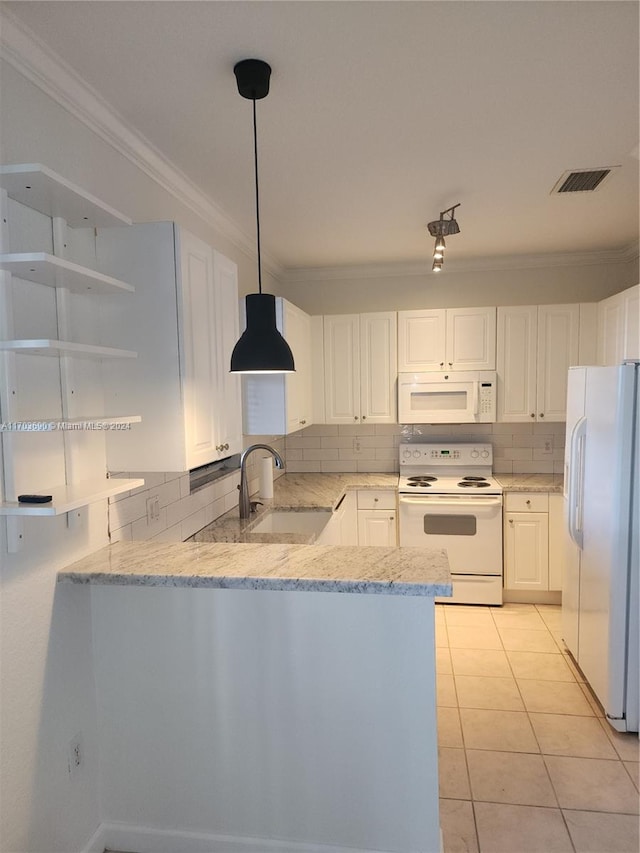 kitchen featuring kitchen peninsula, tasteful backsplash, ornamental molding, white appliances, and white cabinets