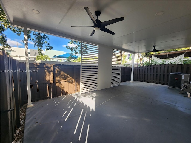 view of patio featuring central AC unit and ceiling fan