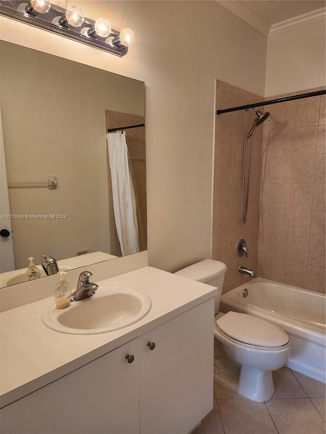 full bathroom featuring shower / bath combo, tile patterned floors, toilet, vanity, and ornamental molding