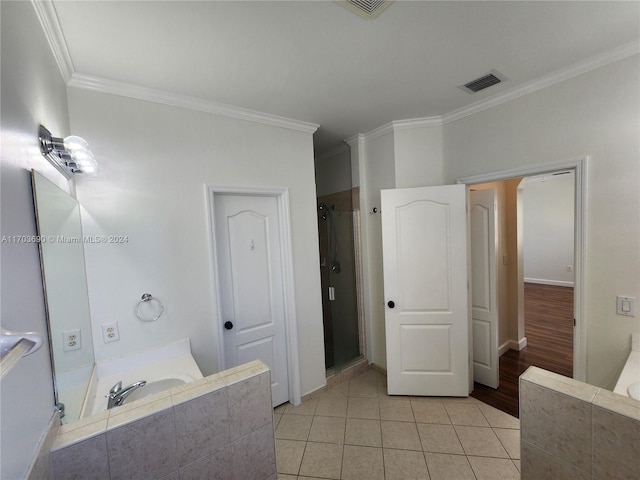 bathroom with wood-type flooring, vanity, shower with separate bathtub, and crown molding