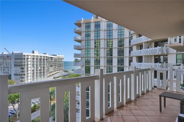 balcony featuring a water view