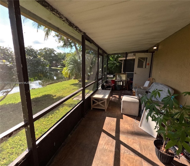 sunroom with a water view