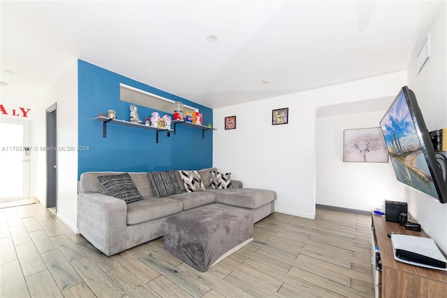 living room with light hardwood / wood-style flooring