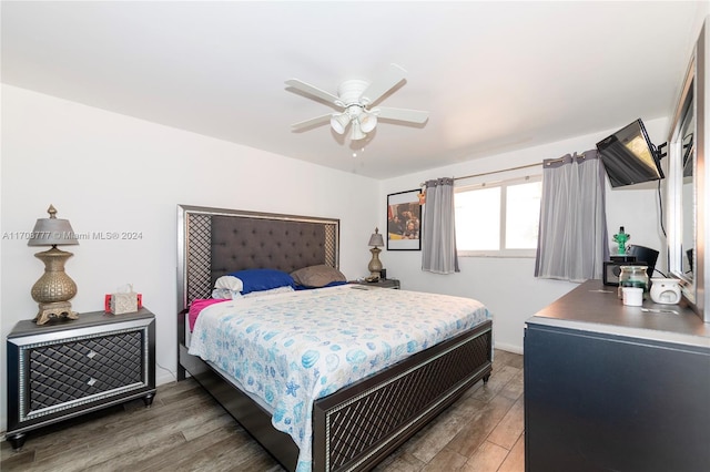 bedroom featuring ceiling fan and hardwood / wood-style floors