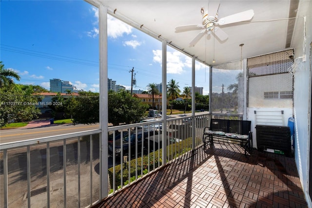 balcony featuring ceiling fan