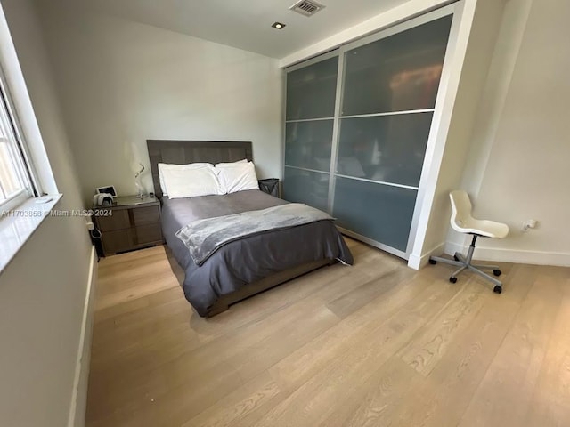 bedroom featuring light hardwood / wood-style floors