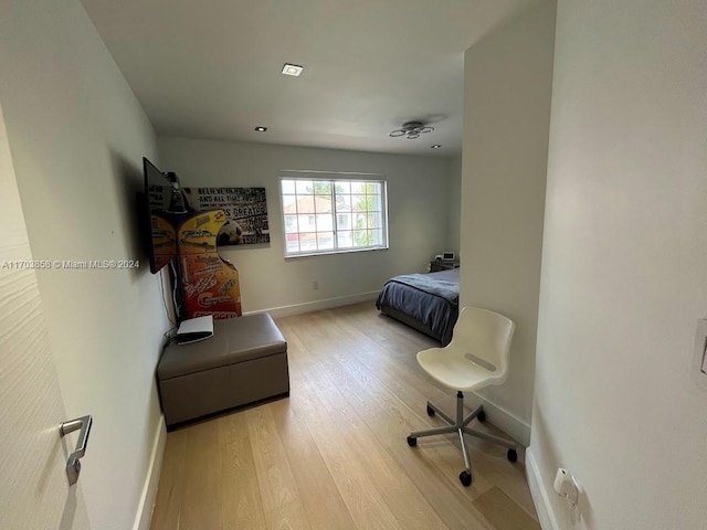 bedroom featuring hardwood / wood-style floors