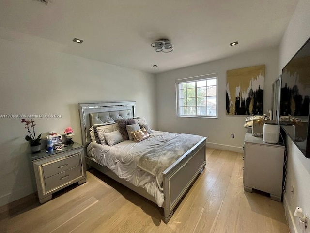 bedroom featuring light hardwood / wood-style flooring