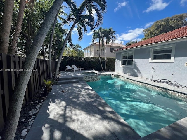 view of pool with a patio