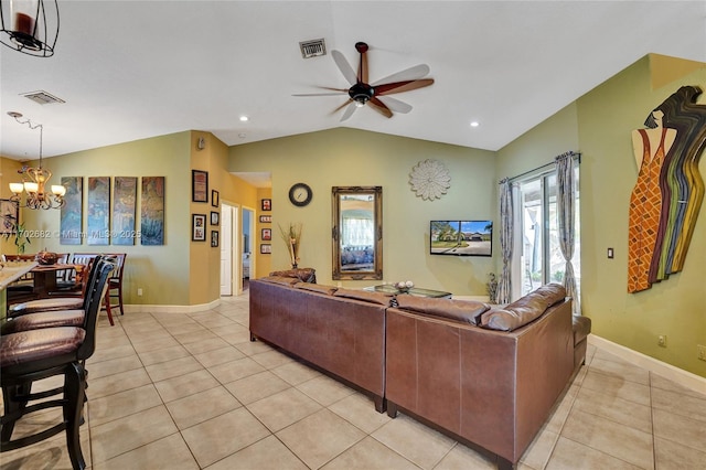 living room featuring light tile patterned floors, visible vents, lofted ceiling, and ceiling fan with notable chandelier